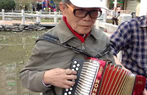 Músico macaense (Fotografia de Chan Fang Ting)